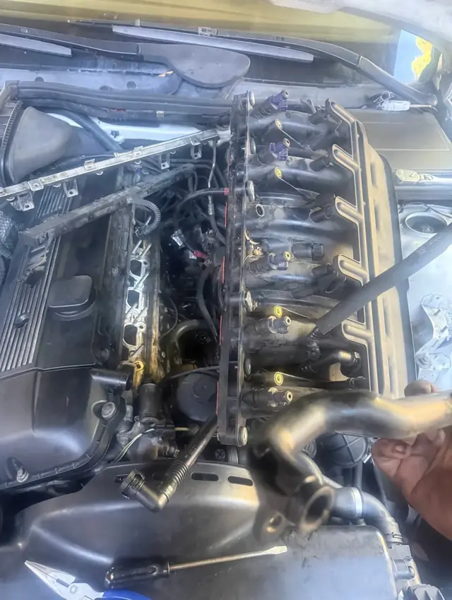 BMW inline-six intake manifold removed for repair