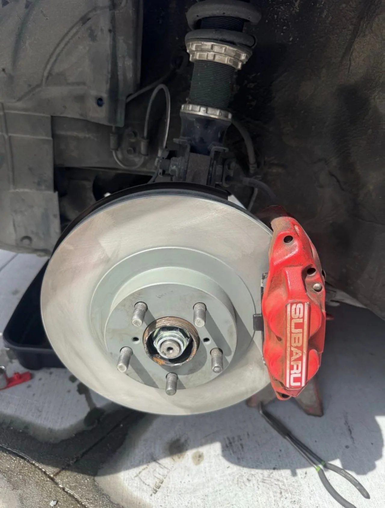 Subaru brake rotor and caliper